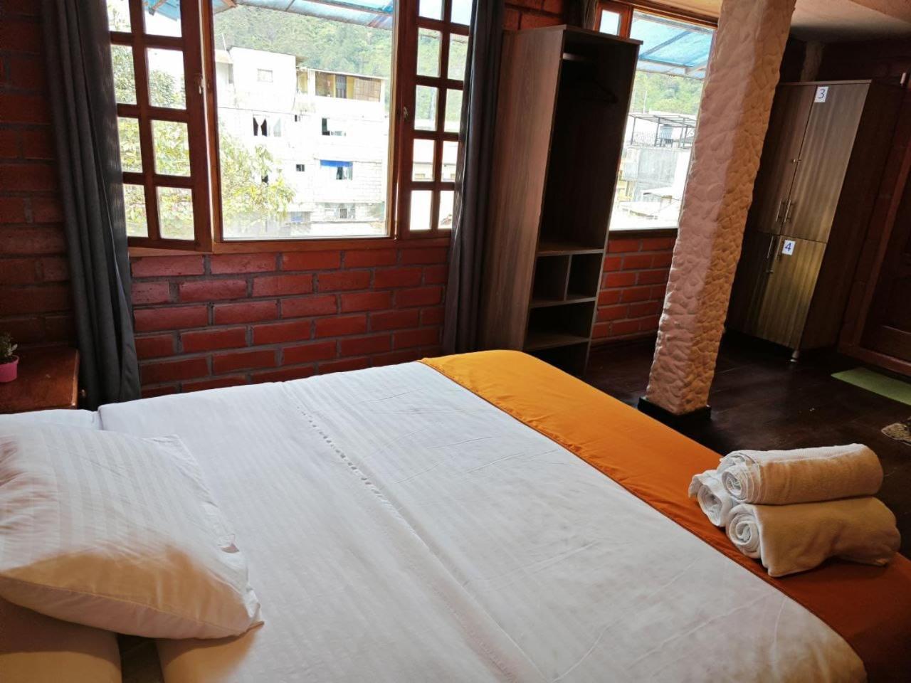 Garden House Hostal Baños Eksteriør billede