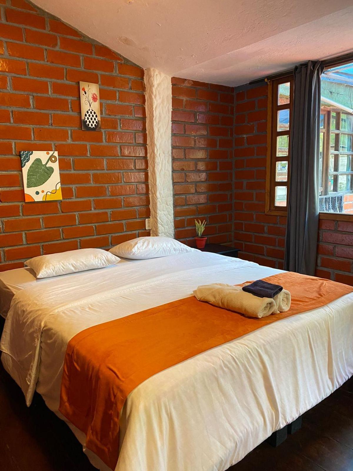 Garden House Hostal Baños Eksteriør billede