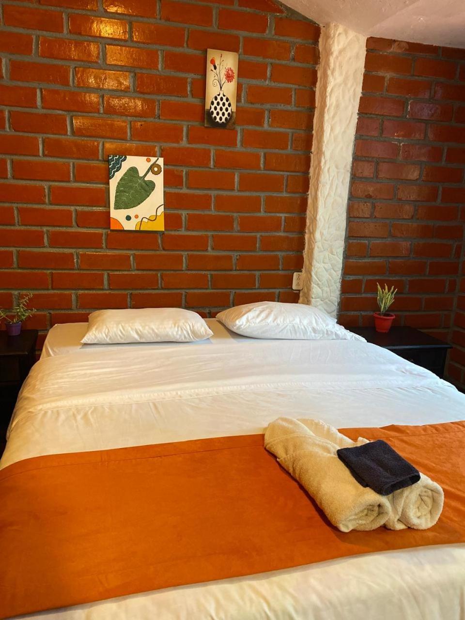 Garden House Hostal Baños Eksteriør billede